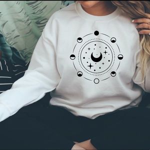 White moon phases crew neck pull over sweater
